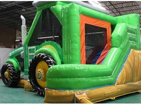 Giant Green Tractor Bounce House.