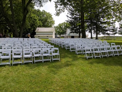 Outdoor Wedding - White Padded Chairs.