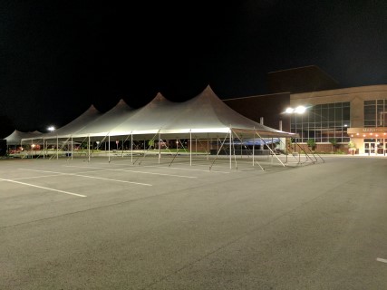 Red Cross Fundraiser at the Marathon Center for the Performing Arts - 10' x 10' Pop-up Tents, 40' x 100' Tent, 20' x 40' Tent, Rectangular Tables, Steel Chairs, Stage, Tent Lights.